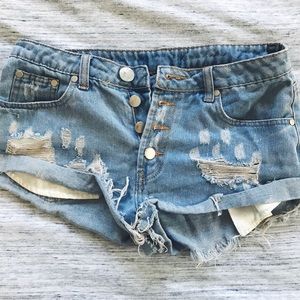 Mid rise Distressed Cheeky Shorts